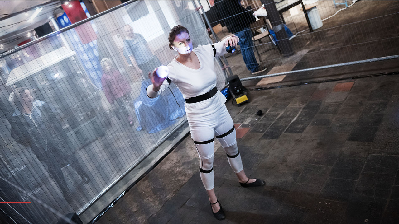 Dancer wearing the DeviceD haptic feedback system during a performance